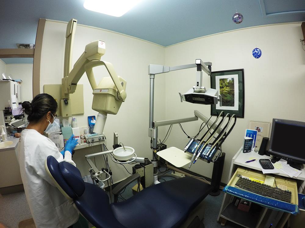 Dental office reception with patient forms